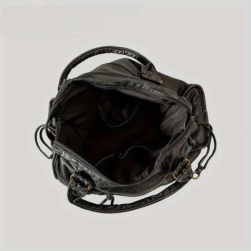Sac à main en cuir noir avec poche zippée